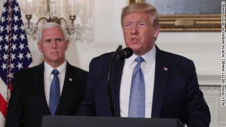 WASHINGTON, DC - AUGUST 05: U.S. President Donald Trump makes remarks in the Diplomatic Reception Room of the White House as U.S. Vice President Mike Pence looks on August 5, 2019 in Washington, DC. President Trump delivered remarks on the mass shootings in El Paso, Texas, and Dayton, Ohio, over the weekend.  (Photo by Alex Wong/Getty Images)
