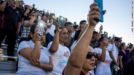 Community members attend a vigil for a high school student gunned down in this month&#39;s El Paso shooting.