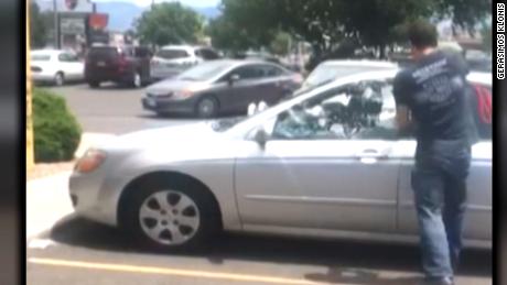 Man Smashes Window To Rescue Dog From Hot Car