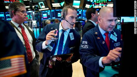 NEW YORK, NY - AUGUST 6: Traders and financial professionals work at the opening bell on the floor of the New York Stock Exchange (NYSE) on August 6, 2019 in the Brooklyn borough of  New York City. The Dow Jones Industrial Average traded 220 points higher at the open on Tuesday, after U.S. markets had their worst trading day of 2019 on Monday amid escalations in the U.S.-China trade war. (Photo by Drew Angerer/Getty Images)