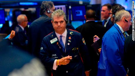 Traders work after the opening bell at the New York Stock Exchange (NYSE) on August 5, 2019 at Wall Street in New York City. - Selling on Wall Street accelerated early Monday as a steep drop in the Chinese yuan escalated the US-China trade war following President Trump&#39;s announcement of new tariffs last week. (Photo by Johannes EISELE / AFP)        (Photo credit should read JOHANNES EISELE/AFP/Getty Images)