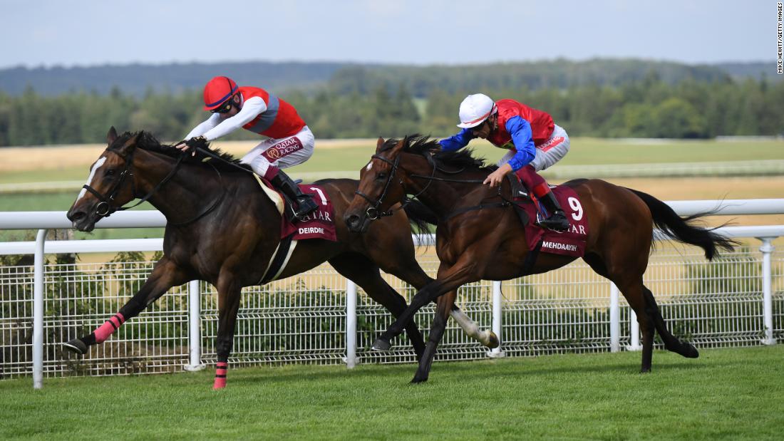 Oisin Murphy and Deirdre (left) overhauled Frankie Dettori on Mehdaayih to win the historic Nassau Stakes.