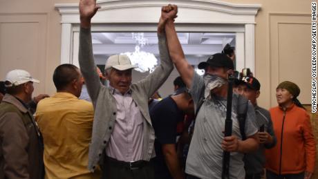 Supporters of former Kyrgyz president Almazbek Atambayev reportedly guard his house in the village of Koi-Tash on August 7.