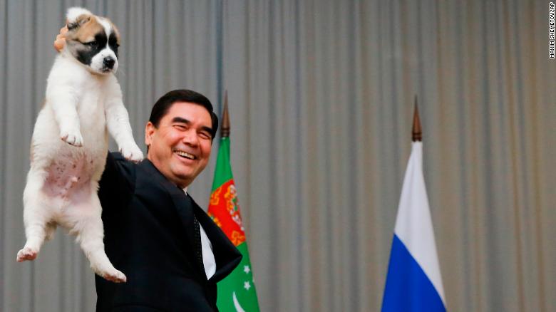 Turkmenistan&#39;s President Gurbanguly Berdymukhamedo holds up a puppy he intended to give to Russian President Vladimir Putin in the Black Sea resort of Sochi, Russia, in 2017. 