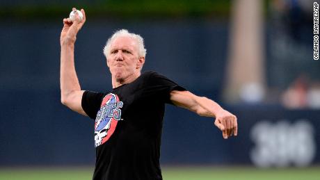 Bill Walton throws out the first pitch before the game between the San Diego Padres and the Colorado Rockies.