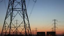 HINKLEY POINT, ENGLAND - JULY 17: Electric pylons linking the Hinkley Point Nuclear Power Station to the National Grid are seen on July 17, 2006 in Somerset, England. The Prime Minister Tony Blair has called for the construction of more nuclear power stations to replace the ones that are due to be de-commissioned and to help meet the UK&#39;s target for cutting harmful greenhouse gases.(Photo by Matt Cardy/Getty Images)