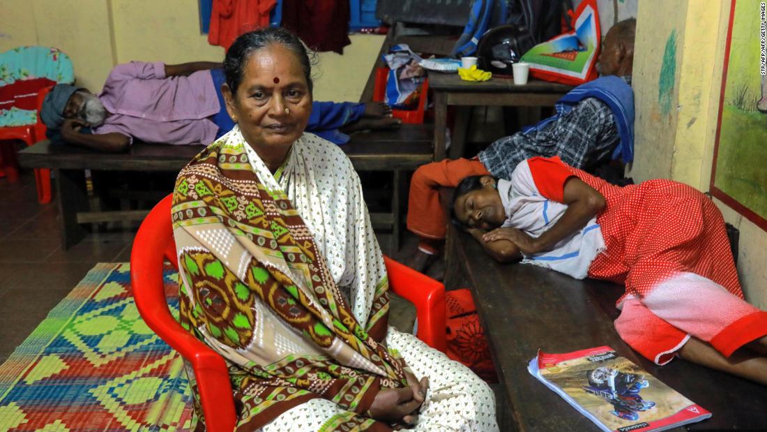 Refugees rest in a relief camp at Eloor in Kochi in the Indian state of Kerala.