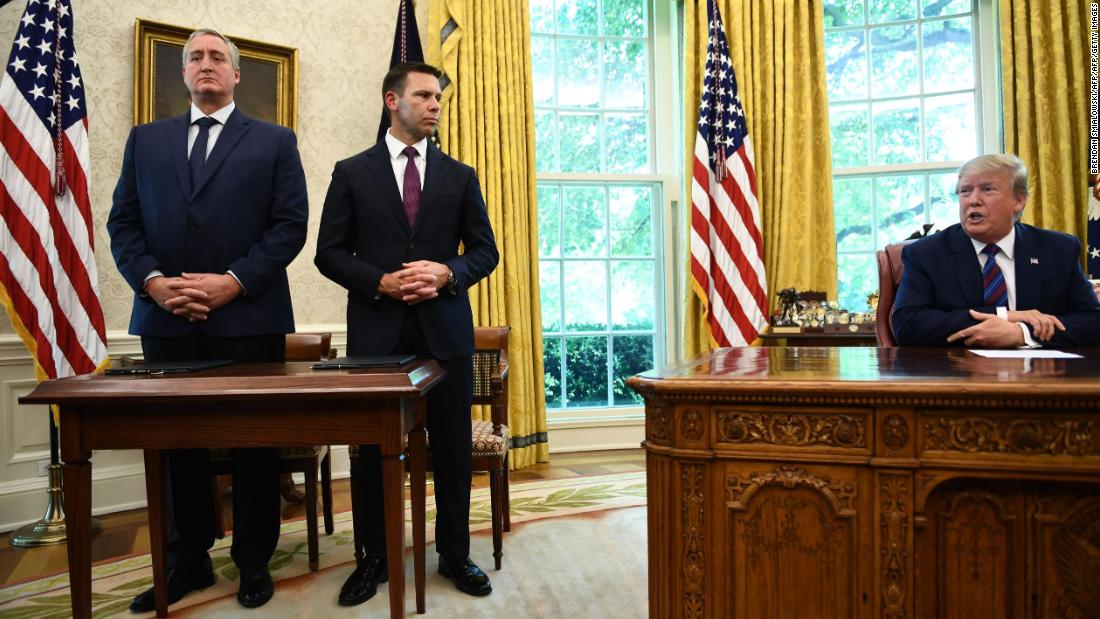 Donald Trump with the Guatemalan Interior Minister Enrique Degenhart and acting US Homeland Security Secretary Kevin McAleenan after signing the "Safe Third Country" deal in the Oval Office.