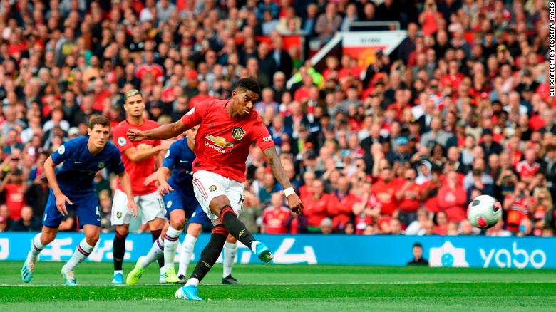 Rashford scores from the spot against Chelsea.