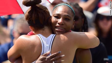 Canada&#39;s Bianca Andreescu, left, consoles Serena Williams, of the United States, after Williams had to retire from the final of the Rogers Cup tennis tournament in Toronto on Sunday.