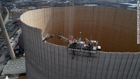 The robot eating its way around the cooling tower. 