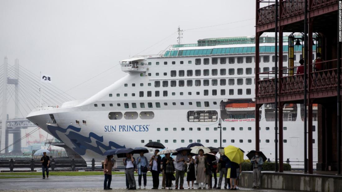 This picture taken on July 16, 2019, shows Sun Princess cruise ship, docked in the port of Yokohama.