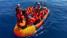 An inflatable dinghy, belonging to the &quot;Ocean Viking&quot; rescue ship, operated by French NGOs SOS Mediterranee and Medecins sans Frontieres (MSF), rescues migrants in the Mediterranean in August 2019.