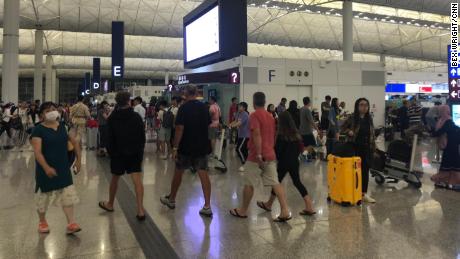 Order returns to Hong Kong airport, but tensions linger