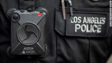 A Los Angeles police officer wears an Axon body camera in 2017. Axon said earlier this year that it would not install facial-recognition technology in its body cameras, stating it&#39;s &quot;not currently reliable enough.&quot; (Photo by David McNew/Getty Images)