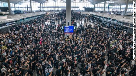 Protesters occupy the departure hall of the Hong Kong International Airport during a demonstration on August 12, 2019.