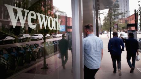 CHICAGO, ILLINOIS - AUGUST 14:  A sign marks the location of a WeWork office facility on August 14, 2019 in Chicago, Illinois. WeWork, a real estate firm that leases shared office space, announced today that it had filed a financial prospectus with regulators to become a publicly traded company. (Photo by Scott Olson/Getty Images)