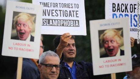 Protesters outside the Hillingdon Conservative Association office in 2018 in Boris Johnson&#39;s constituency of Uxbridge, England.