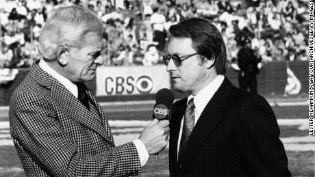 Jack Whitaker interviews Deane Beman during a 1976 NFL playoff game between the Los Angeles Rams and Dallas Cowboys.