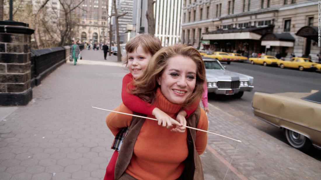 Walters carries her daughter, Jackie, circa 1970. Jackie is Walters&#39; only child. She adopted her with her second husband, Lee Guber.