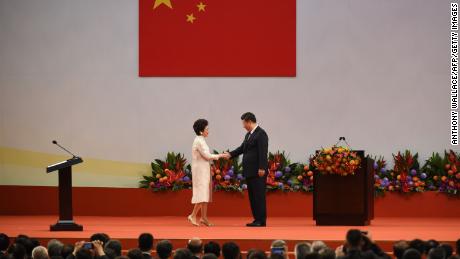 Hong Kong&#39;s Chief Executive Carrie Lam shakes hands with China&#39;s President Xi Jinping after being sworn in as the territory&#39;s leader in 2017. 