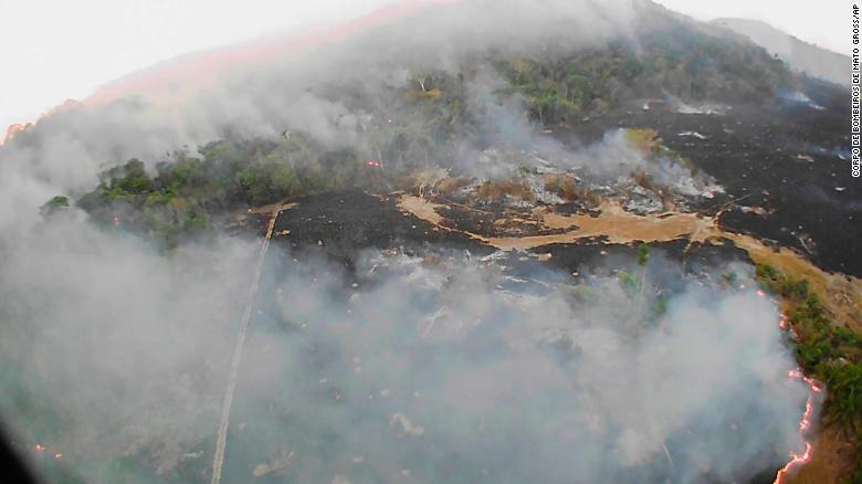 In this Aug. 20, 2019 drone photo released by the Corpo de Bombeiros de Mato Grosso, brush fires burn in Guaranta do Norte municipality, Mato Grosso state, Brazil.