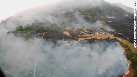 In this Aug. 20, 2019 drone photo released by the Corpo de Bombeiros de Mato Grosso, brush fires burn in Guaranta do Norte municipality, Mato Grosso state, Brazil.