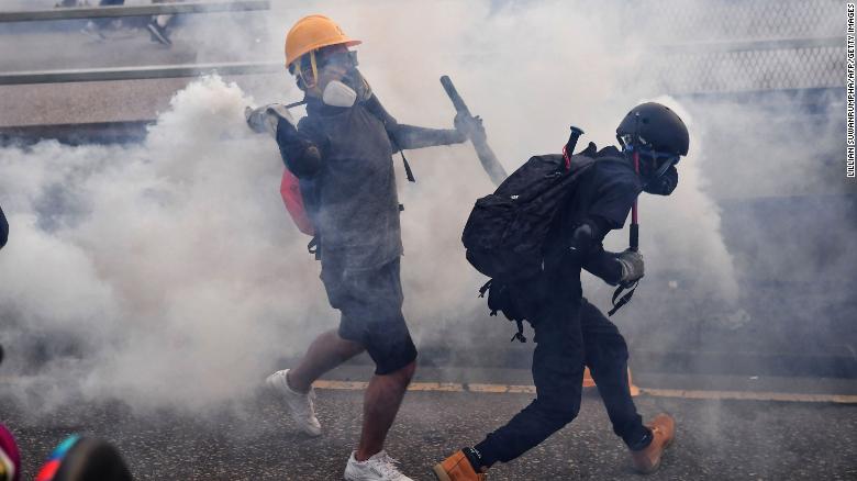 Hong Kong protests end with clashes between police and small group - CNN