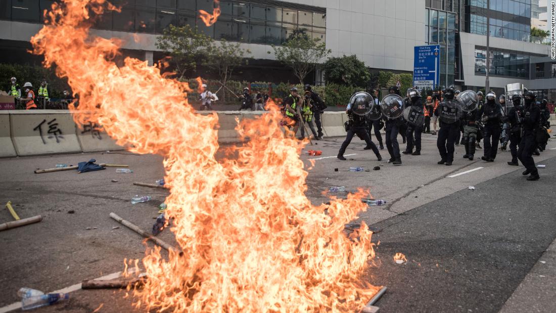 Police retreat after clashing with protesters on August 24.