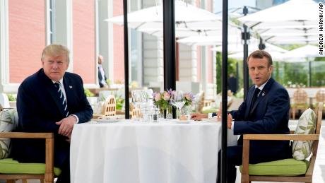 U.S President Donald Trump sits for lunch with French President Emmanuel Macron, right, at the Hotel du Palais in Biarritz, south-west France, Saturday Aug. 24, 2019. Efforts to salvage consensus among the Group of Seven rich democracies on the economy, trade and environment were fraying around the edges even as leaders were arriving before their three-day summit in southern France. (AP Photo/Andrew Harnik)