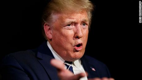 President Donald Trump speaks with reporters as he walks to Marine One on the South Lawn of the White House, Friday, Aug. 23, 2019, in Washington. Trump is en route to the G-7 summit in France. (AP Photo/Alex Brandon)