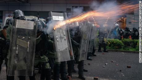 Riot police fire tear gas at protesters during a clash at an anti-government rally in Tsuen Wan district on August 25, 2019 in Hong Kong.