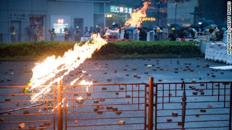 A Molotov cocktail is thrown by protesters in August. 