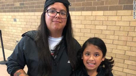 Anna Maddox and her little sister Leah Chau traveled two hours to get to a Harris rally.