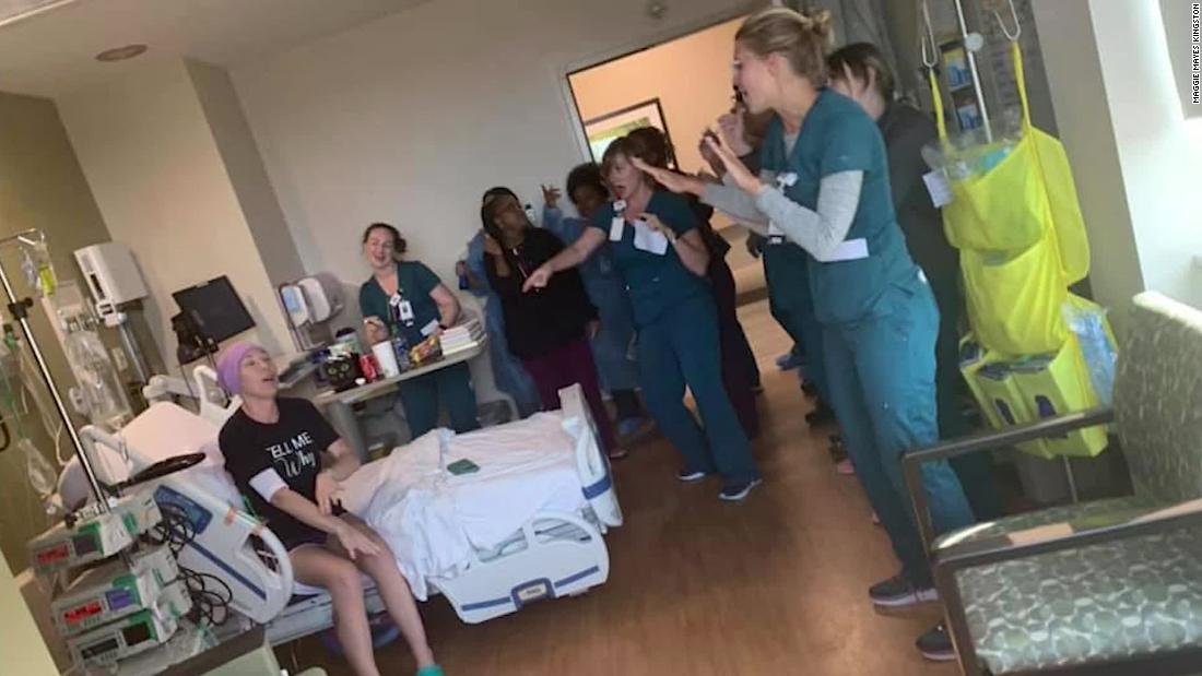 Neighbors Surprise Nurse With Musical Performance