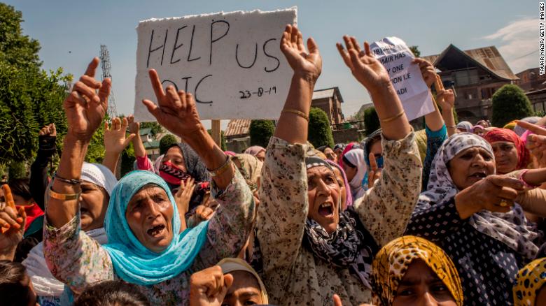 Kashmiri Muslim women shout anti Indian slogans during an anti Indian protest, on August 23, 2019 in Srinagar.