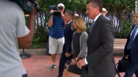 Lori Loughlin and her husband appear at hearing in college admissions scam