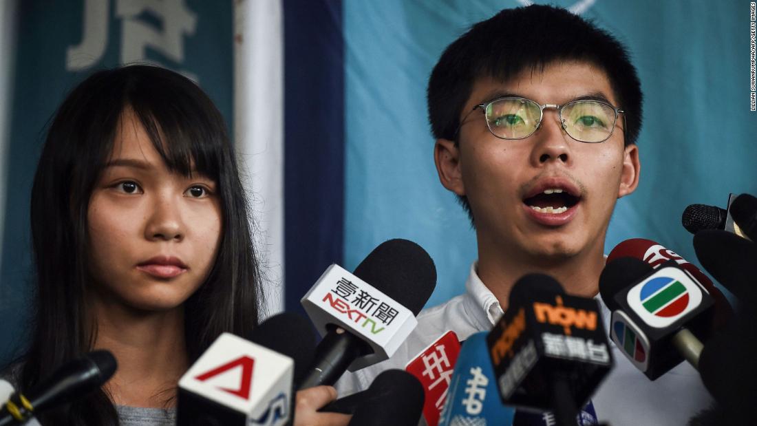 After arrests, thousands take to Hong Kong streets for 13th weekend of protests
