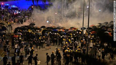 Police fire tear gas at protesters near the government headquarters on July 2.