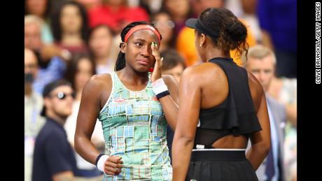 Osaka consoles Gauff (left) after their match at the US Open. 