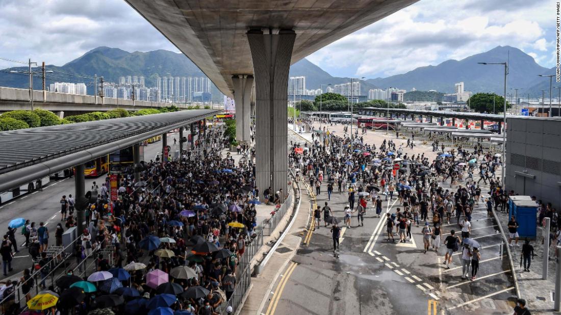 Protesters gather in the bus terminal at Hong Kong International Airport on Sunday, September 1. Hundreds of pro-democracy activists attempted to block transport routes to the city's airport.