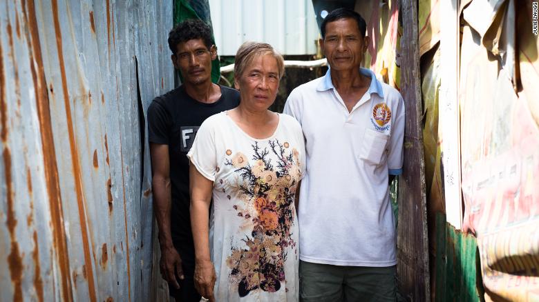 Boeun Korng, with her husband Sang Pien, 56, her son Mien Saran, 46. They were evicted from their homes in 2007 and will have to move again to make way for a new Chinese highway.