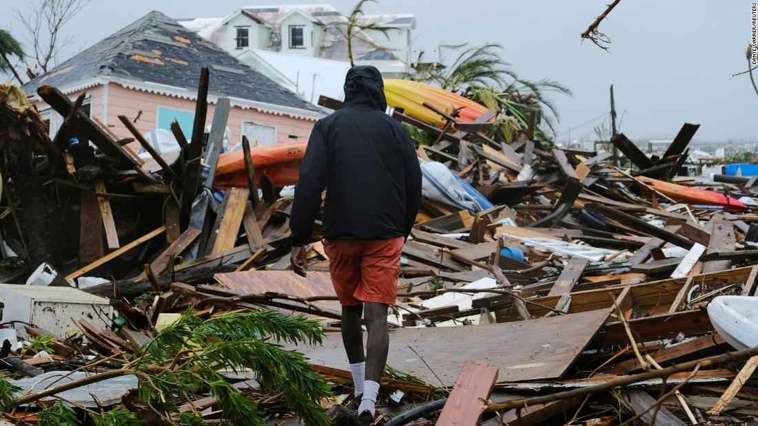 He put his son on a roof for safety after the hurricane hit. A storm surge swallowed the 5-year-old - CNN thumbnail