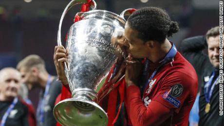 Liverpool&#39;s Virgil van Dijk kisses UEFA Champions League trophy. He was reported to have cost the club £75 million ($92.7 million) from Southampton.