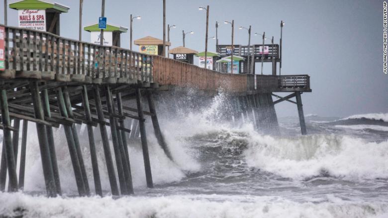 Waves pound the Bogue Inlet Fishing Pier in Emerald Isle, N.C.,as Hurricane Dorian moves north off the coast. 