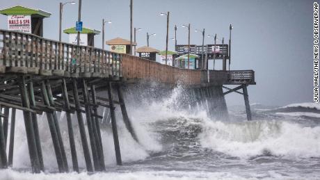 Waves pound the Bogue Inlet Fishing Pier in Emerald Isle, N.C.,as Hurricane Dorian moves north off the coast. (Julia Wall/The News & Observer via AP)