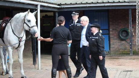 Prime Minister Boris Johnson was introduced to a police horse just before his speech.