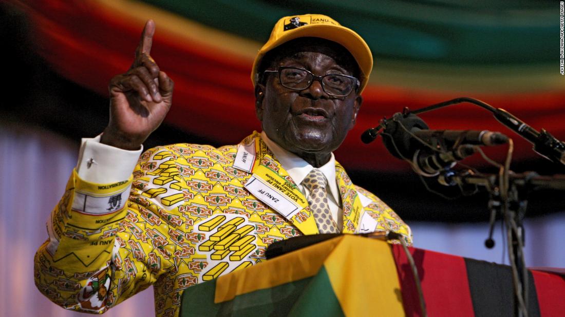 Mugabe delivers a speech at his party&#39;s annual national conference in December 2012. He vowed to overhaul business laws to require 100% black ownership of firms.