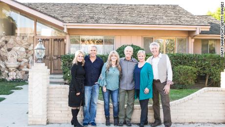 Maureen McCormick, Christopher Knight, Susan Olsen, Mike Lookinland, Eve Plumb and Barry Williams in front of the original Brady home in Studio City, CA, as seen on &#39;A Very Brady Renovation.&#39;