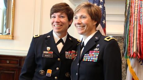 Maj. Gen. Maria Barrett poses with Brig. Gen. Paula Lodi during then Col. Lodi's promotion ceremony at the Army Navy Country Club in Arlington, VA on 12 July 2019.